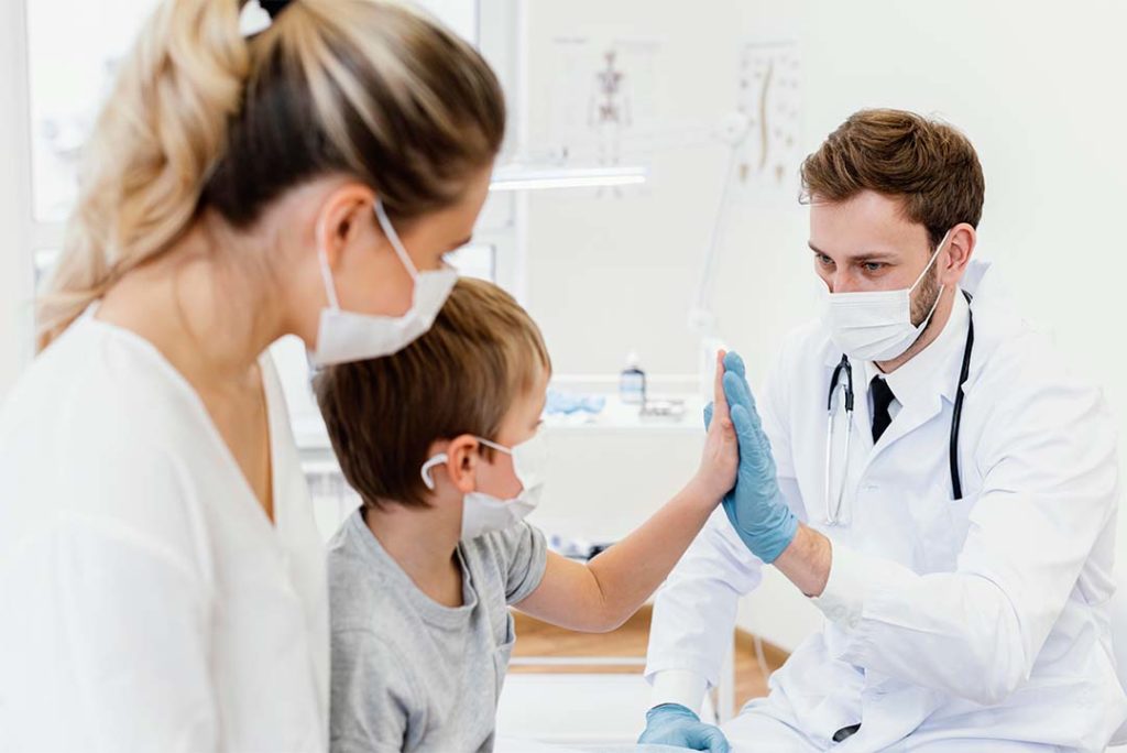 Pediatric Hospital Photo - Dr. High Fiving Child